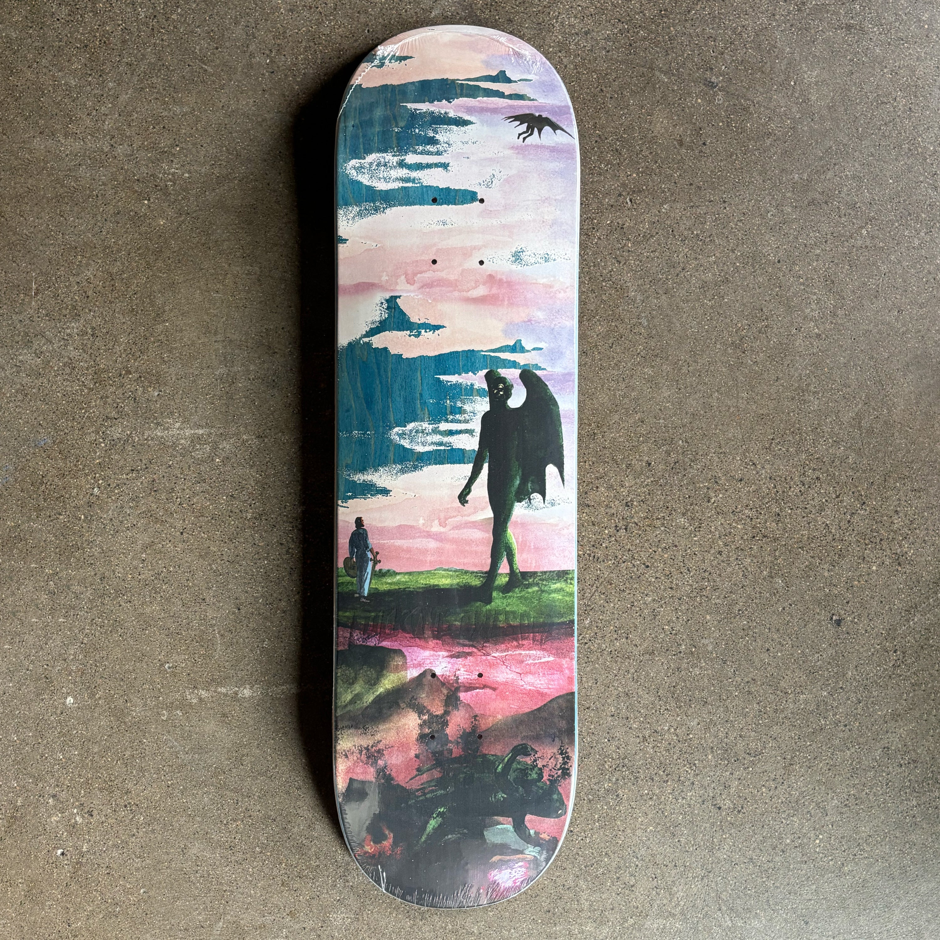 Full image of deck with art of demon walking.